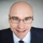 c8fa7c6f-f6b4-446f-a762-2ae3b721b6a8-close-up-male-executive-with-glasses.jpg